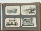 an open book with pictures of buildings and people on it