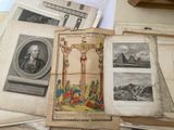 a pile of old books with pictures of people on them