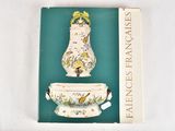 a book with a picture of a vase on top of it