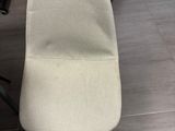 a chair that is sitting in the corner of a room