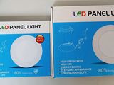two boxes of led panel lights on a shelf