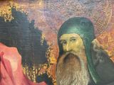 a painting of a man with a beard and a green hat