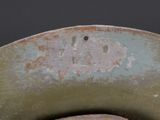a close up of a metal object with rust on it