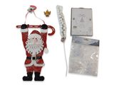 décoration de Noël représentant le Père Noël tenant une canne en sucre et un sac de bonbons
