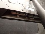 a close up of a laptop with a cable attached to it