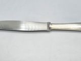 a knife that is sitting on a table