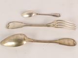 three silver spoons and a fork on a white surface