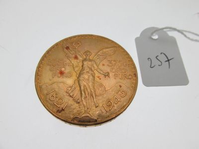 a close up of a coin with a price tag on it