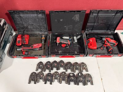 a lot of tools that are sitting on a table