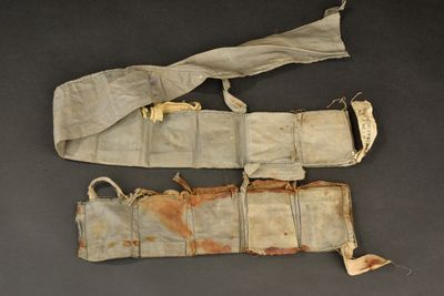 an image of a pair of old military equipment on a table