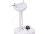 un lavabo blanc muni d'un robinet et d'un mitigeur