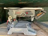 a picture of a table saw sitting on top of a piece of wood