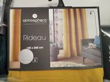 a box with a picture of a living room in it