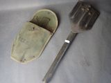 an old spatula next to an old spatula on a table
