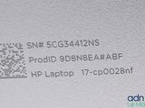 the back of a laptop with a qr code on it