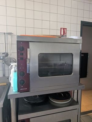 an image of a commercial oven in a kitchen