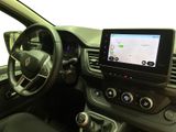 the interior of a car with a steering wheel, dashboard, and navigation system