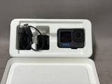 a white box with a charger and a charger in it