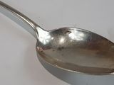 a spoon that is sitting on a table