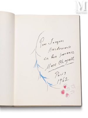 an open book with a drawing of a woman ' s face on it