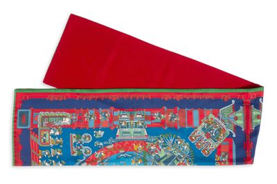 un sac rouge et bleu sur lequel est représenté un train