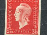 a red and black stamp with a woman ' s face on it