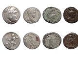 six ancient roman coins are shown in a row on a white background