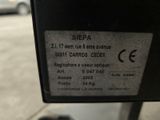 a close up of a parking meter on a city street