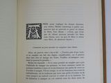 an open book with a picture of a person on it
