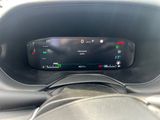 the dashboard of a car with a digital display in the center