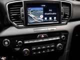 the dashboard of a car with a gps device in the center