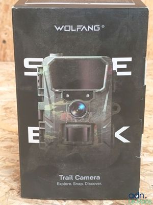an image of a box with a trail camera inside of it