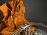 a bag with a gas mask on top of it