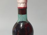 a bottle of wine that is sitting on a table