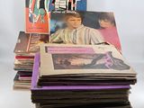 a lot of records stacked on top of each other