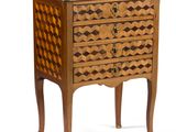 an image of a small chest of drawers
