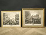 two framed prints of a scene of a street scene with a horse drawn carriage and a horse drawn carriage