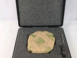 an open briefcase with a piece of paper inside of it