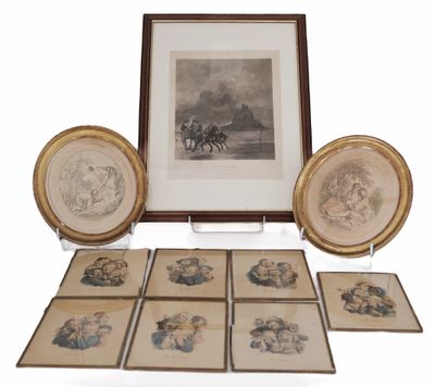 a picture of a group of framed pictures on a table