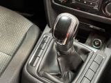 a close up of a car ' s gear lever in the center console