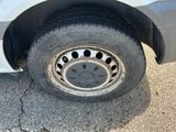 a close up of a flat tire on a car