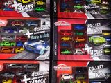 a lot of toy cars that are in the box
