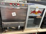 two ovens that are sitting on a table
