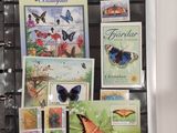 a picture of a binder with a lot of stamps on it