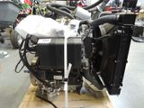 a motorcycle that is sitting on a pallet in a garage