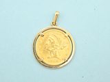 an image of a gold coin with a woman ' s face on it