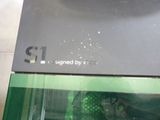 a black box with a sign on it that says signed by xcell