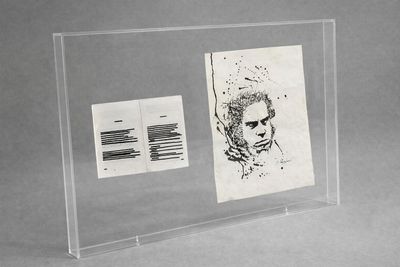 la photo d'une photo représentant un homme, sur une feuille de papier