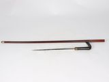 an image of a pair of chopsticks sitting on top of a white surface