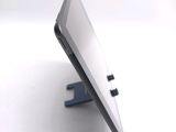 a close up of a cell phone on a stand